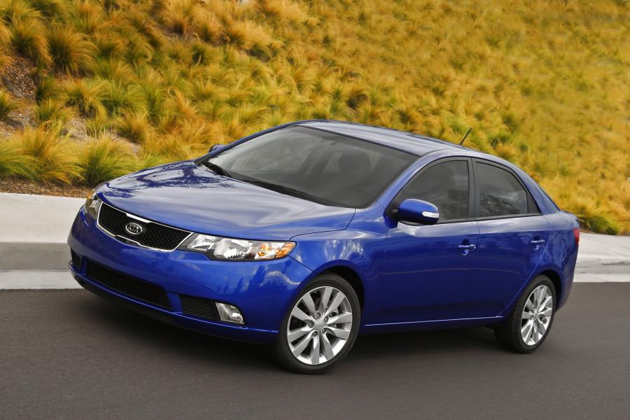  Kia Forte 2009 года  (фото 127 из 128)